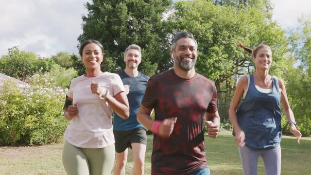 Mature people jogging in park
