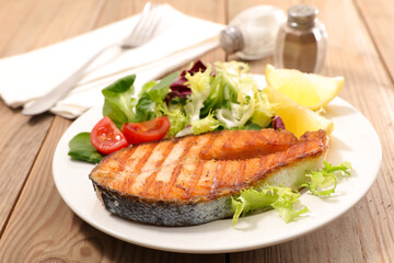grilled salmon steak with lettuce