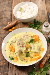 fish fillet cooked with coconut cream and spices