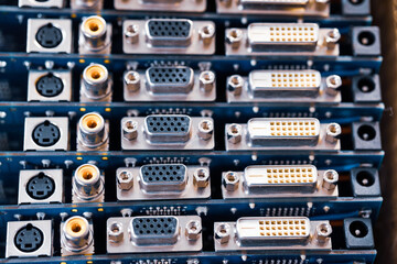 Close-up blurry metal sockets on a computer video board