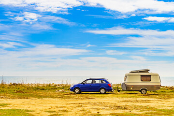 Fototapeta na wymiar Caravan trailer camping on coast, Spain.