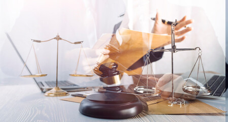 Business and lawyers discussing contract papers with brass scale on desk in office. Law, legal...