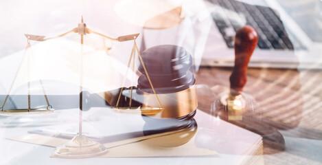 Business and lawyers discussing contract papers with brass scale on desk in office. Law, legal services, advice, justice and law concept picture with film grain effect