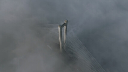 Shot from the clouds, a view of the Kiev bridge during the rain and thunder. Concept: beginning of rain, Copter, South Bridge, Dnieper.