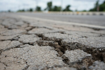 Damaged roads are dangerous for road users.