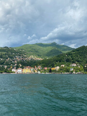 City of Varenna, Italy. A picturesque tourist spot in the mountains. Beautiful city, sunny day. A commune in Italy, located in the Lombardy region, in the province of Lecco.