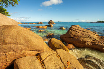 sunrise at tropical beach anse lazio on praslin on the seychelles