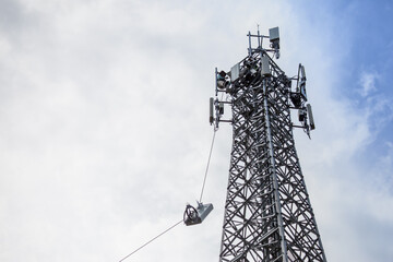 antenna 5g mobile network transmitter was pulled to the top of a mobile phone pole. to upgrade from...