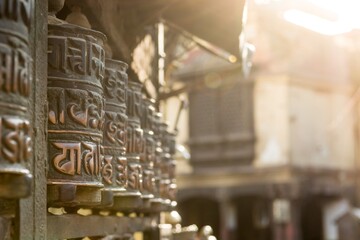 Many prayer wheels - spinning them for good fortune.