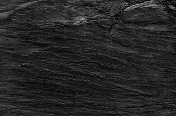 Obraz premium Dark grey black slate background or texture.