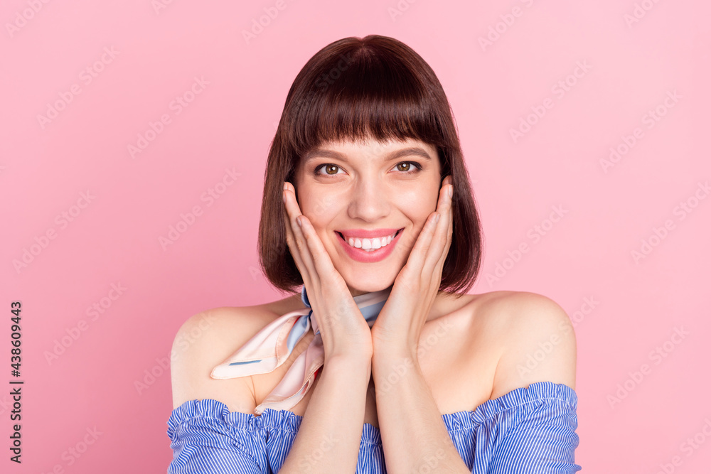 Sticker Photo of charming stunning young woman hold hands face cheeks isolated on pastel pink color background