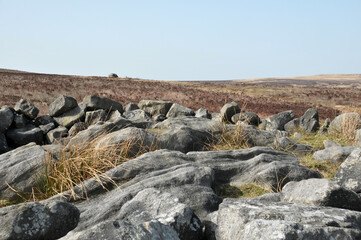 exposed stones at the top of a cairn known as the millers grave on midgley moor in calderdale west...