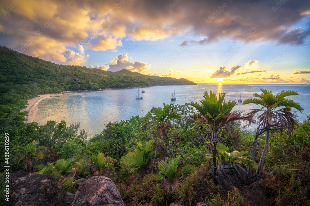 Wall mural sunset at tropical beach anse lazio on praslin on the seychelles