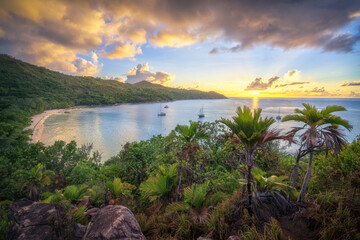 sunset at tropical beach anse lazio on praslin on the seychelles