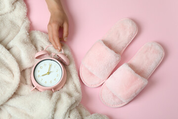 Concept of sleep routine accessories on pink background