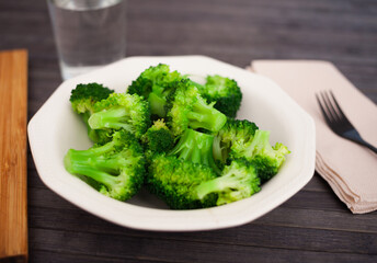 healthy food. steamed broccoli inflorescences in a bowl