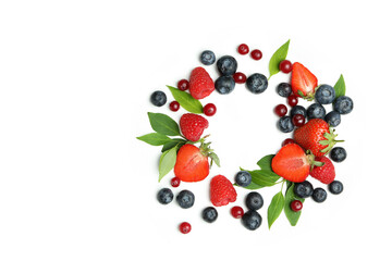 Naklejka na ściany i meble Delicious fresh berry mix on white background
