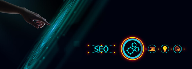 SEO Search engine optimisation digital internet marketing concept. Hand pressing button on screen.
