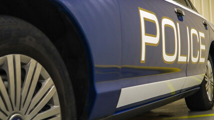 Police car Ford LTD Crown Victoria. Police car in blue with the word police in English. The...