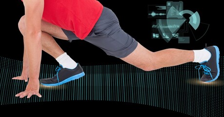 Mid section of male athlete in starting position against digital interface with data processing