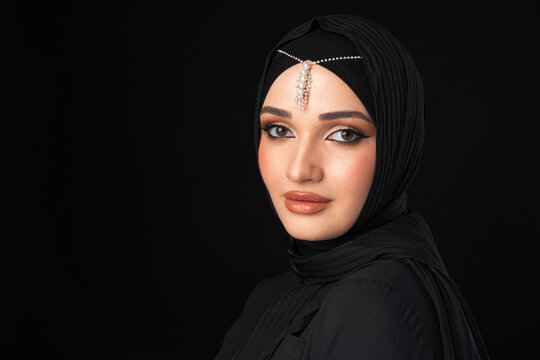 Close up portrait of beautiful muslim girl dressed in hijab