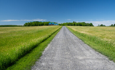 Fototapeta na wymiar Entrance path on a Canadian farm in Quebec