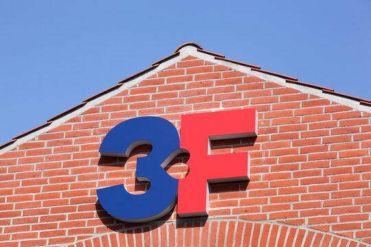 Aarhus, Denmark - April 18, 2021: 3F sign on a building. 3F is the united federation of workers, a Danish labor union