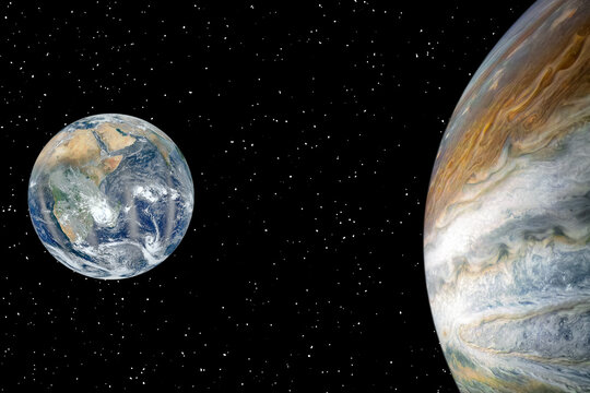 Jupiter and earth. The elements of this image furnished by NASA.