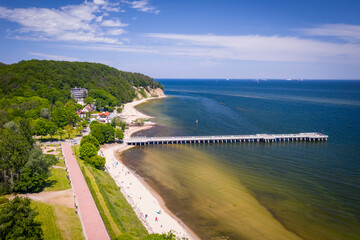 Aerial landscape of the beach and pier of the Baltic Sea in Gdynia Orłowo at summer, Poland.