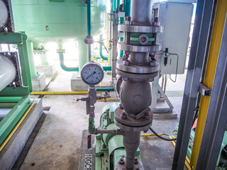 Pressure gauge of measuring instrument close up in industry zone at power plant.