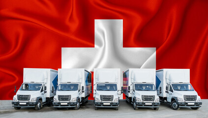 Switzerland flag in the background. Five new white trucks are parked in the parking lot. Truck,...