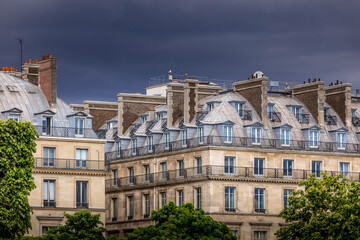 Fototapeta na wymiar Paris, France - May 13, 2021: Typical Haussmannian buildings in Paris