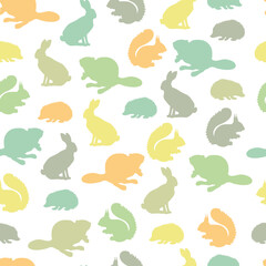 Seamless pattern with silhouettes of forest animals