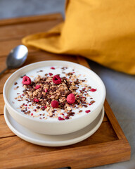 muesli with berries in bowls. Breakfast in the bed