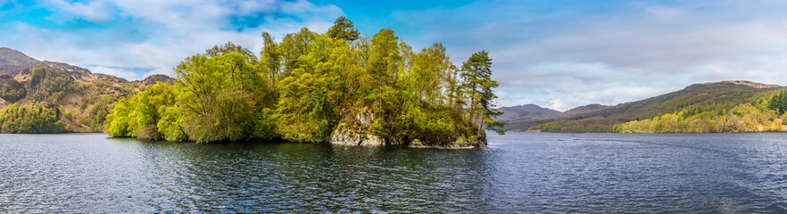 A view westward along Loch Katrine in the Scottish Highlands on a summers day