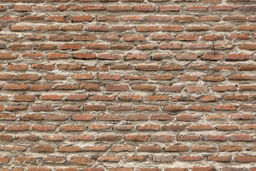 Architecture textures, detailed view of paired masonry brick, traditional spanish orange brick wall