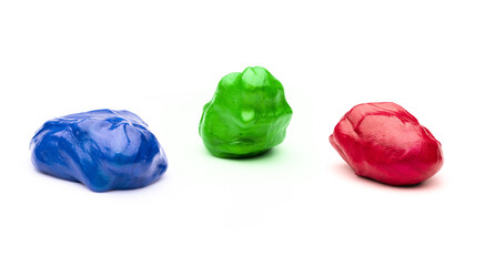 Three colourful plasticine spheres of red, green and blue
