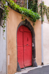 Fototapeta premium Red Door Entrance, Clermont-Ferrand, Auvergne, France