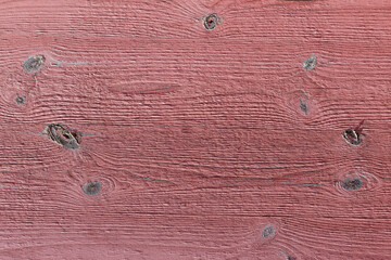 Red painted wooden plank