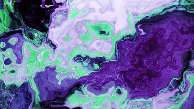 Animation of vibrant coloured purple and green liquid flowing in hypnotic motion