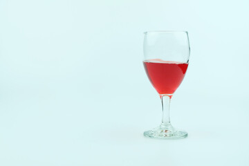 Glass of red wine isolated on white background, with copy space