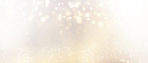abstract glitter silver and gild lights background. de-focused - obrazy, fototapety, plakaty