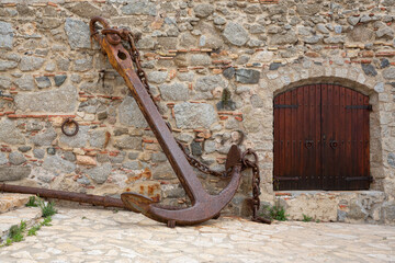 old anchor out the sea in Palafrugell