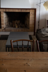 table, chair and fireplace in a restaurant