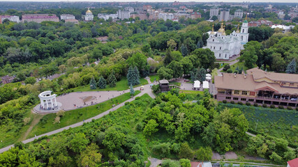 Poltava: Assumption Cathedral and  White gazebo. Historic center and green trees. Ukraine. Europe