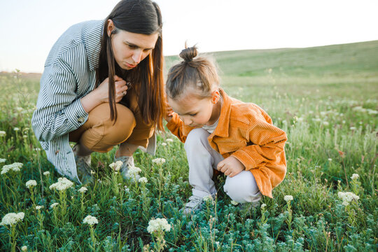 Mom And Son Are Active In Nature.