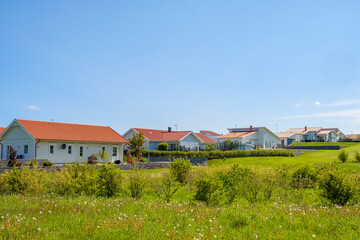 Fototapeta na wymiar Residential area with houses in the summer