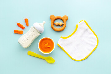 Baby fruits vegetables food with milk bottle and toy