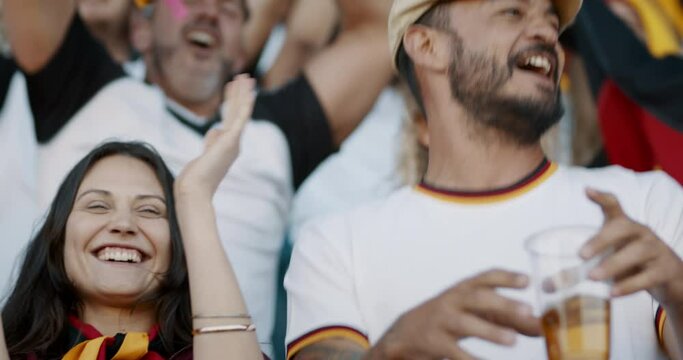 German supporters cheering their team from fan zone