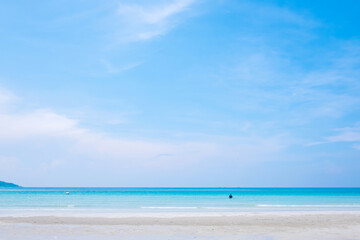 Fototapeta na wymiar Sea and beautiful blue sky. Calm and relaxing empty beach scene.